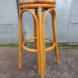 High bar stool in woven rattan
