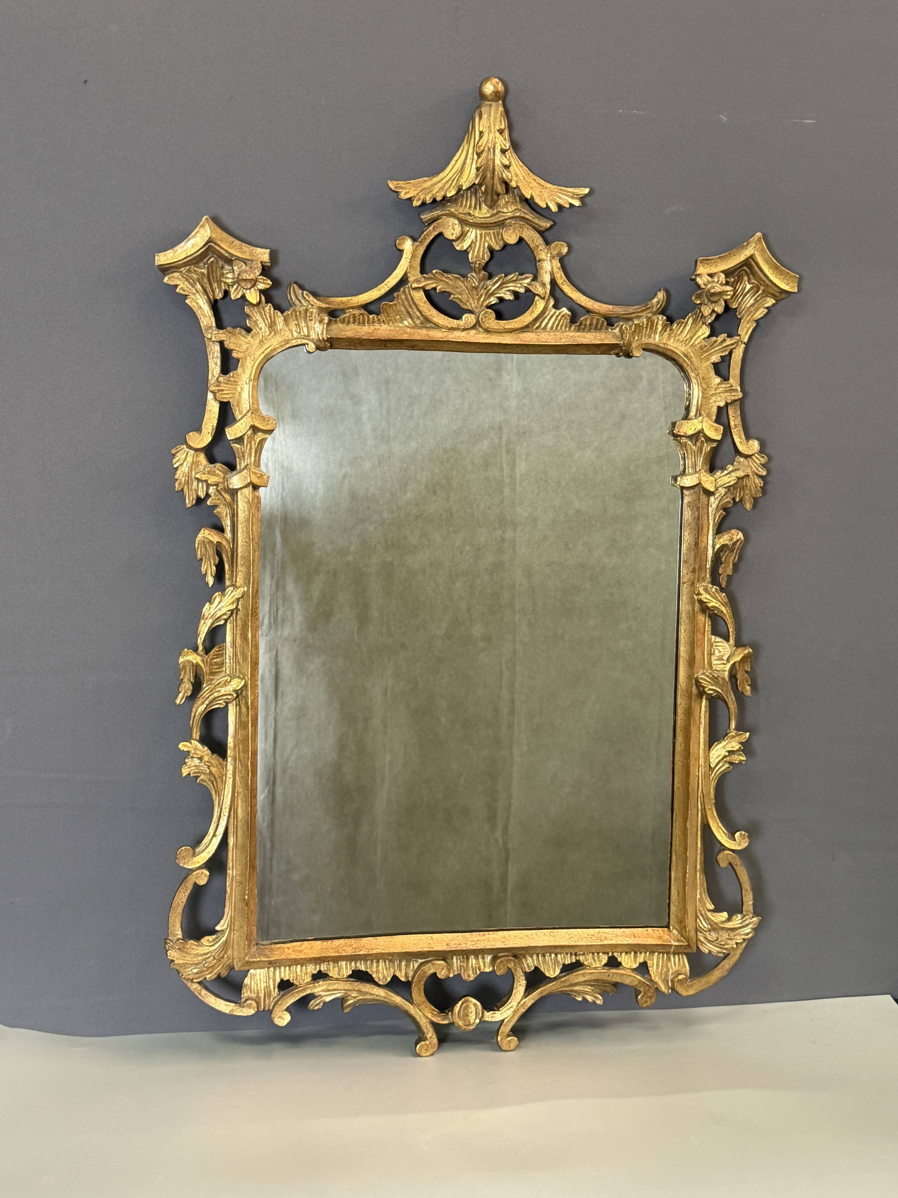 Italian mirror in gilded wood from the 19th century.