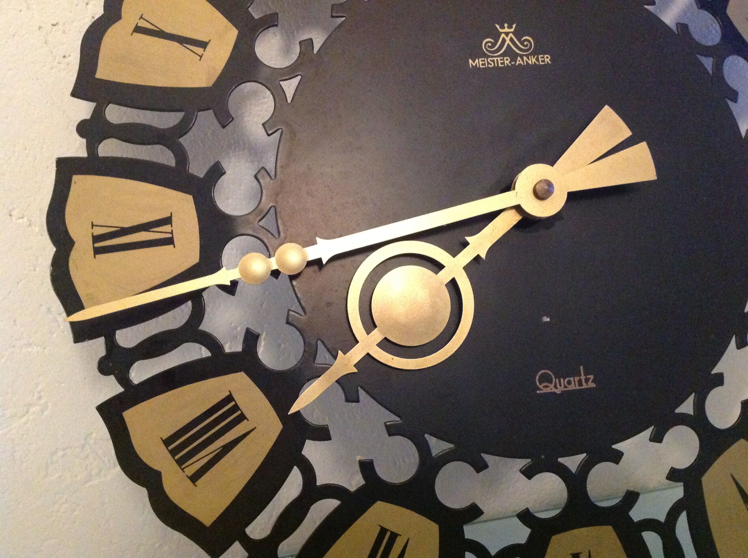 Black and gold metal clock by Meister Anker / vintage 60s-70s