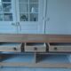 crafted dresser in raw solid wood.