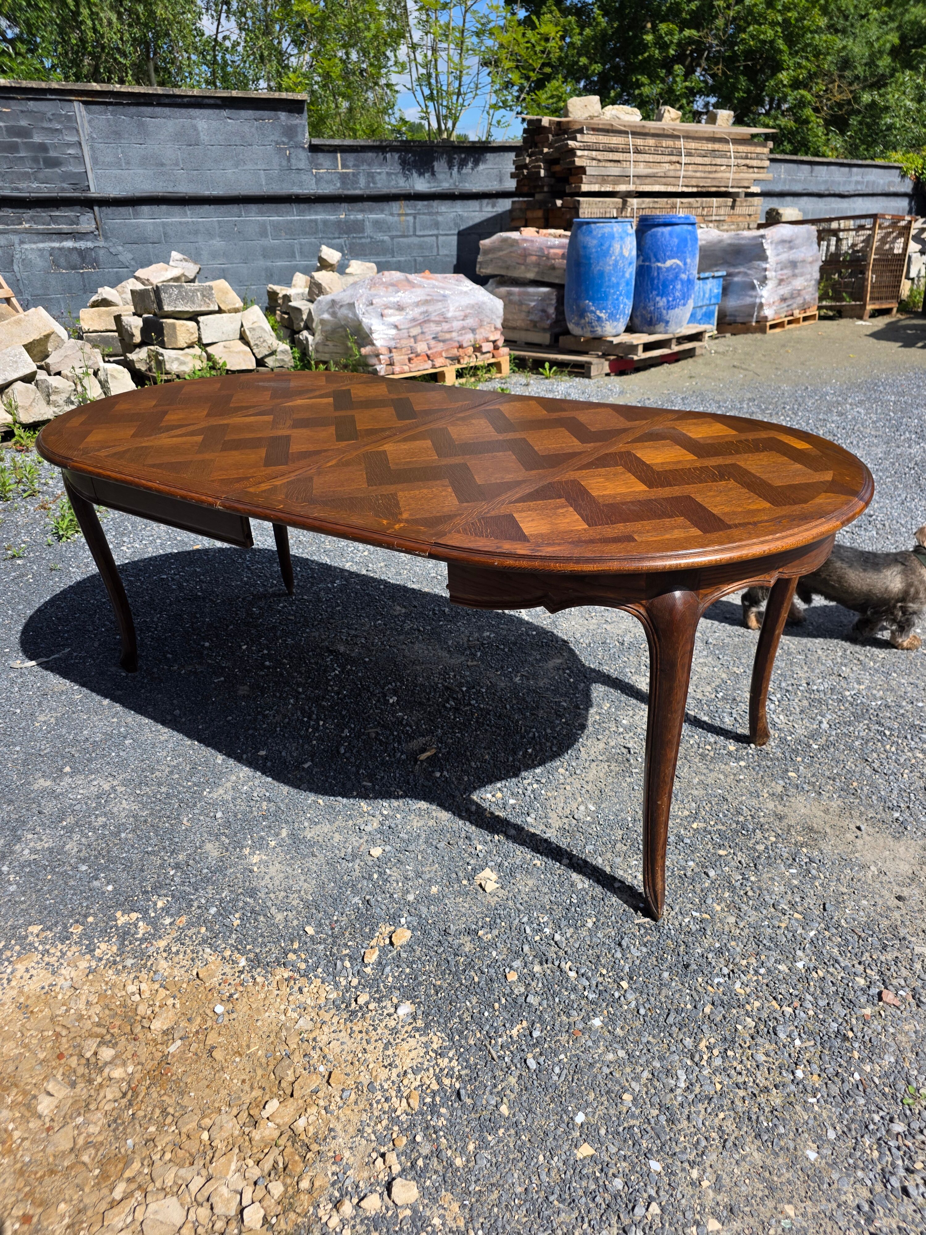 Extendable table in Louis XV style in oak (2 extensions)