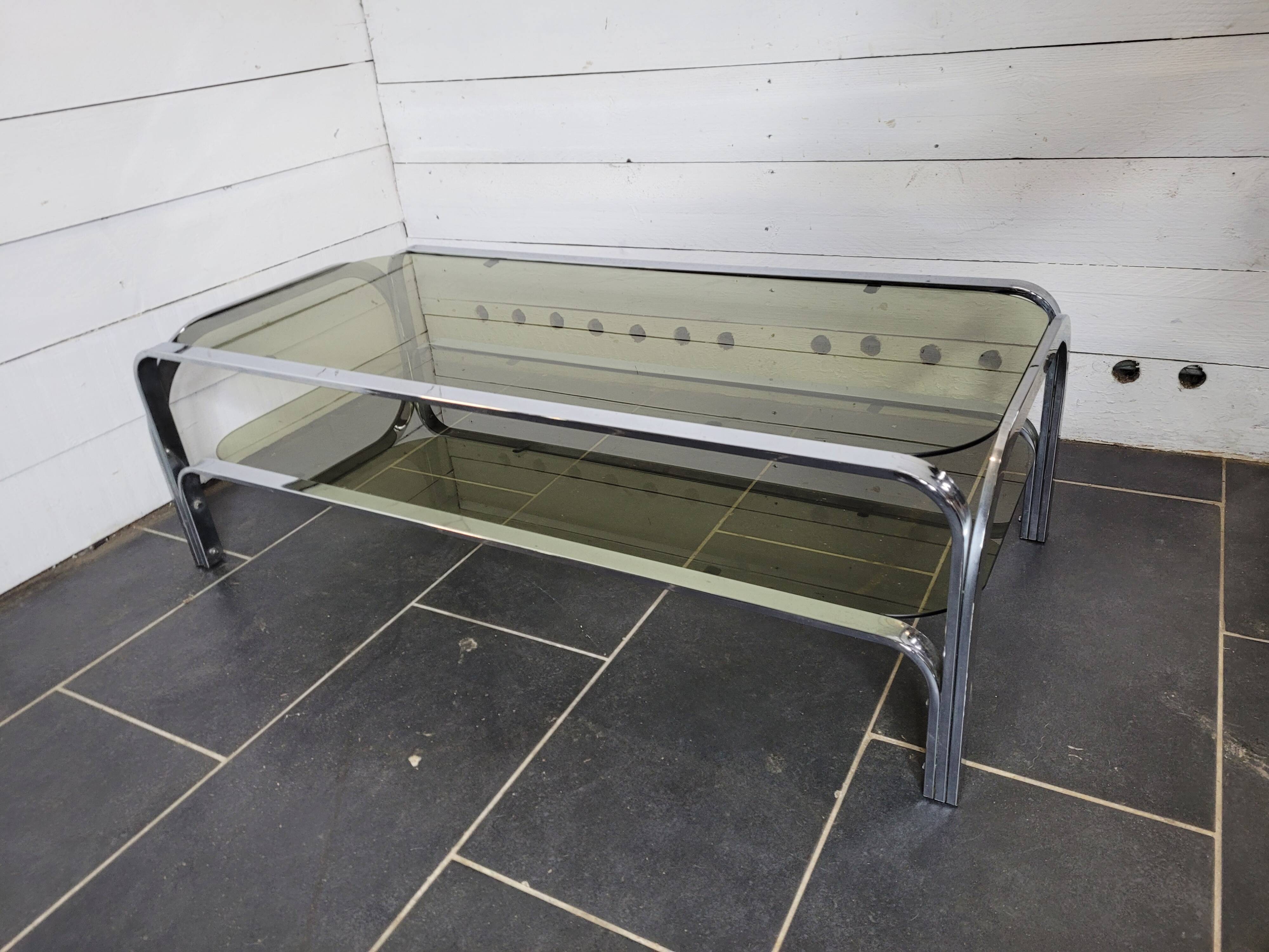 Chromed metal coffee table with smoked glass top from the 70s