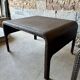Pair of large riveted metal industrial tables