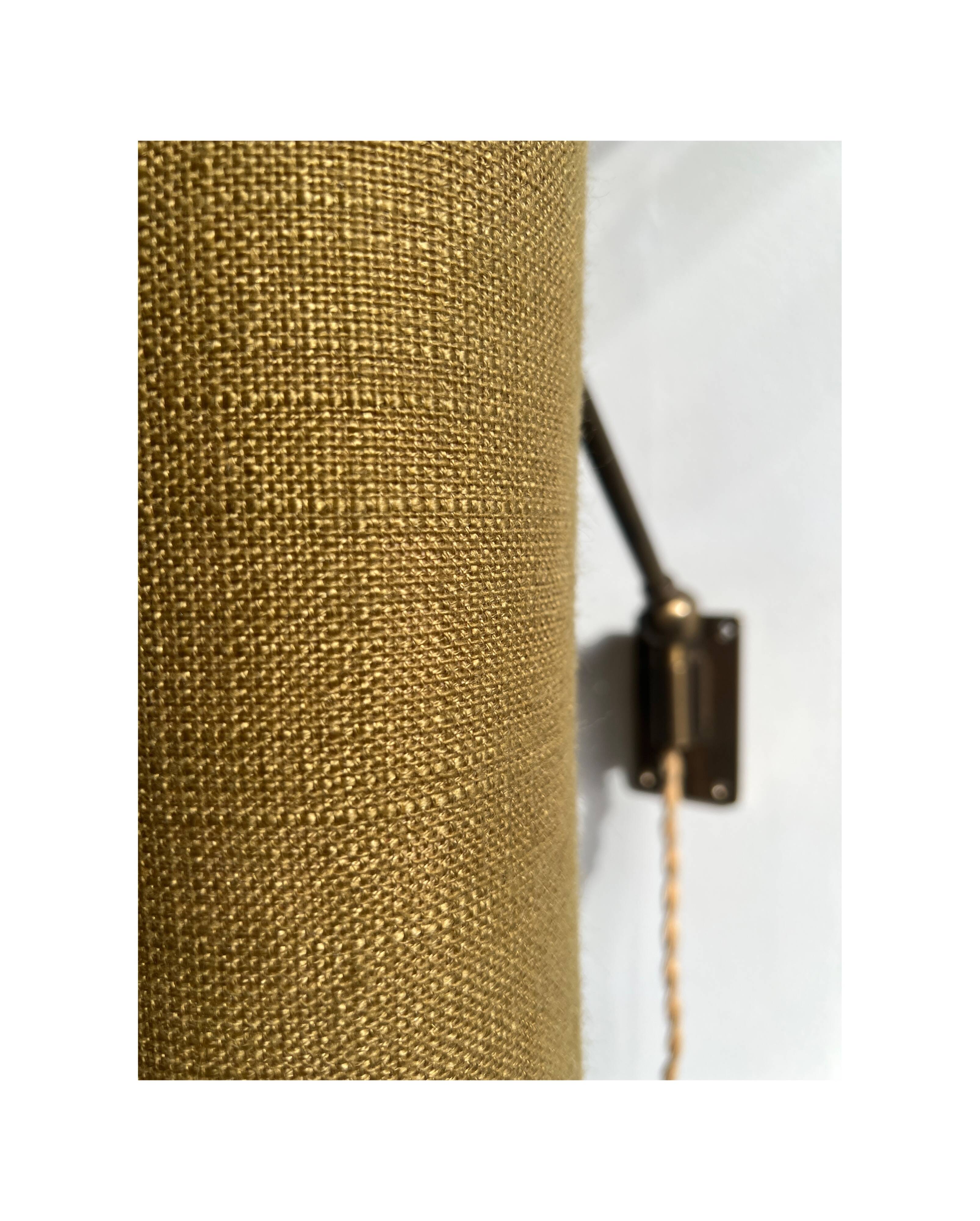 Wall sconce, brass bracket and khaki lampshade, France 1950