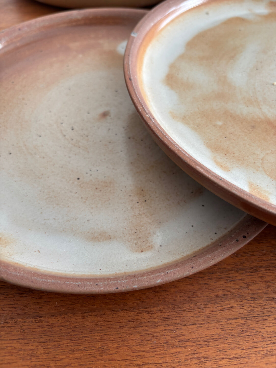 Set of vintage 1970s beige ceramic dinner plates.