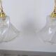 Pair of granite glass and brass pendant lights – poetic elegance