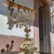Antique candle holder in bronze and brass nineteenth century.