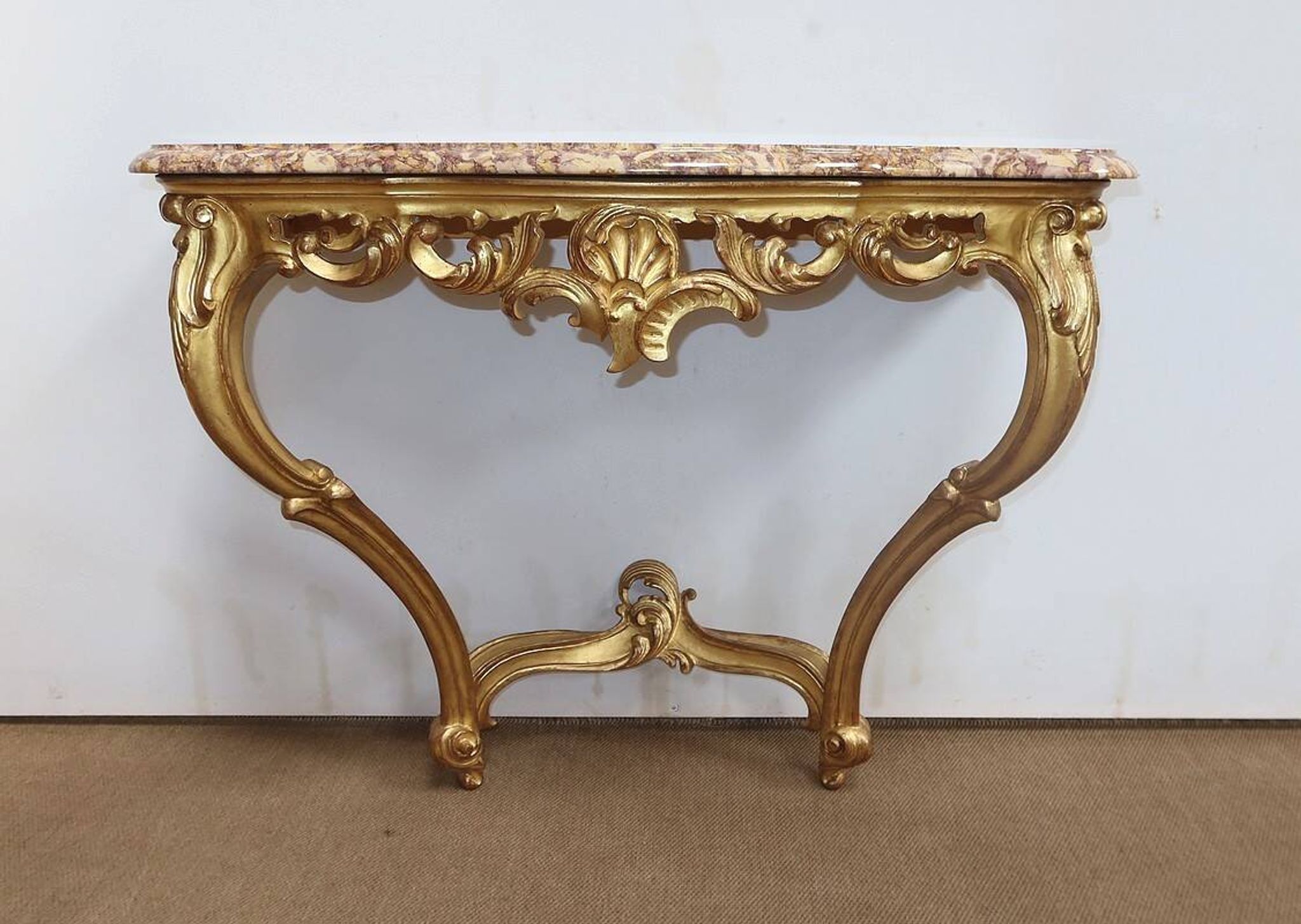 Console murale en bois doré style Louis XV, milieu XXème