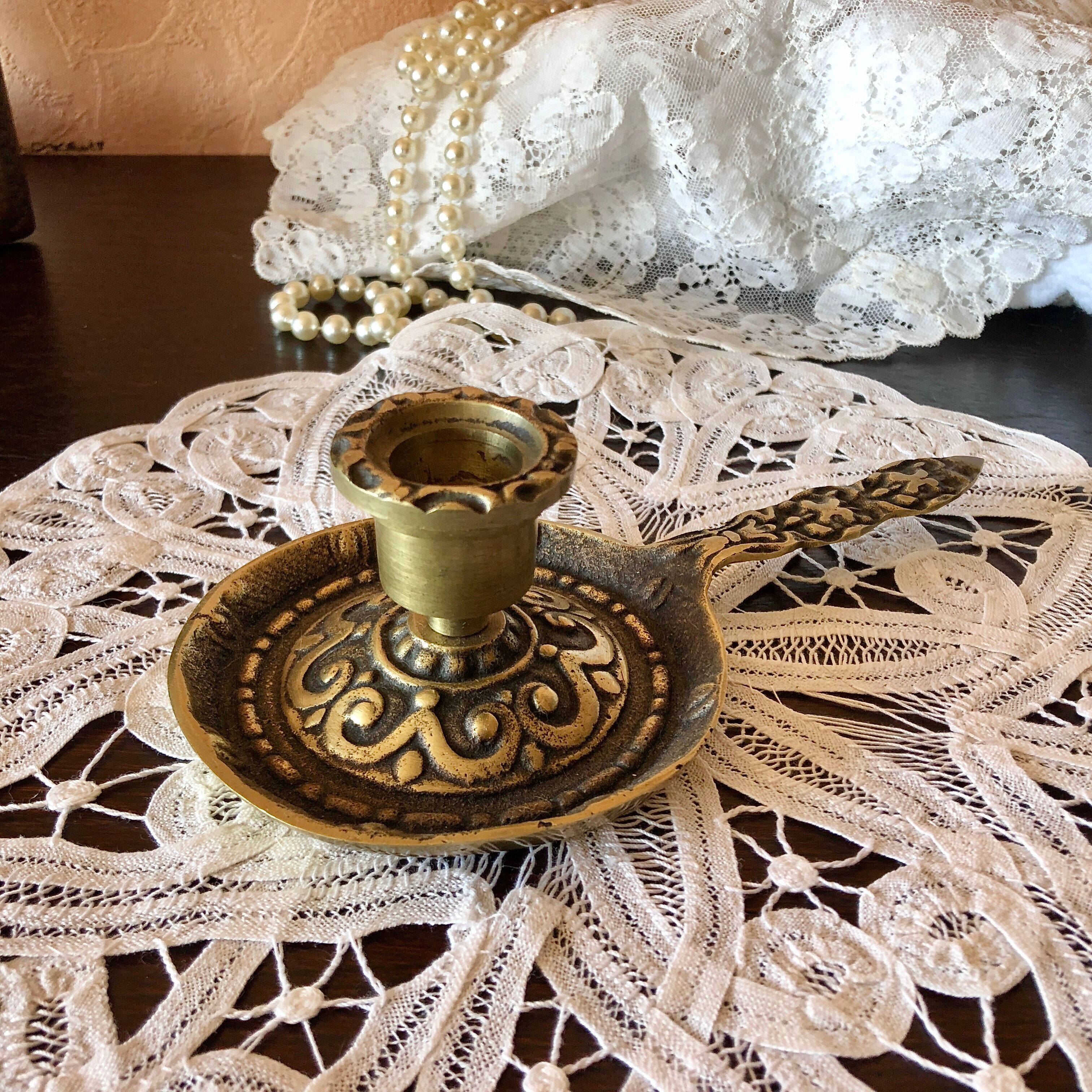 Hand candle holder medieval style solid brass twentieth century