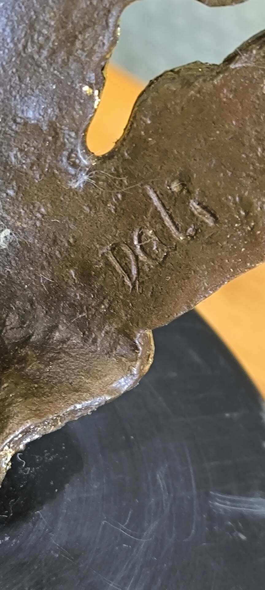 According to Salvador Dalí – The Test of Time – Bronze with gold leaf