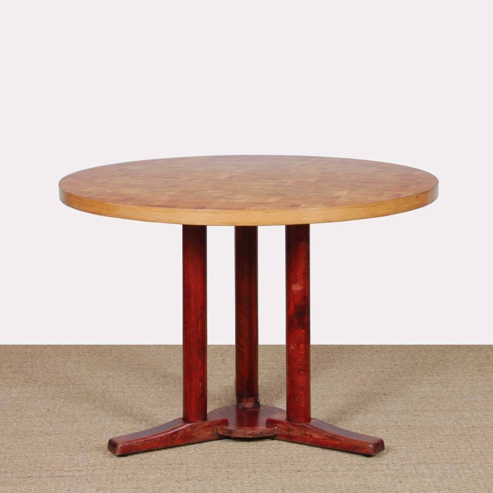 Round wooden dining table from the 1980s.