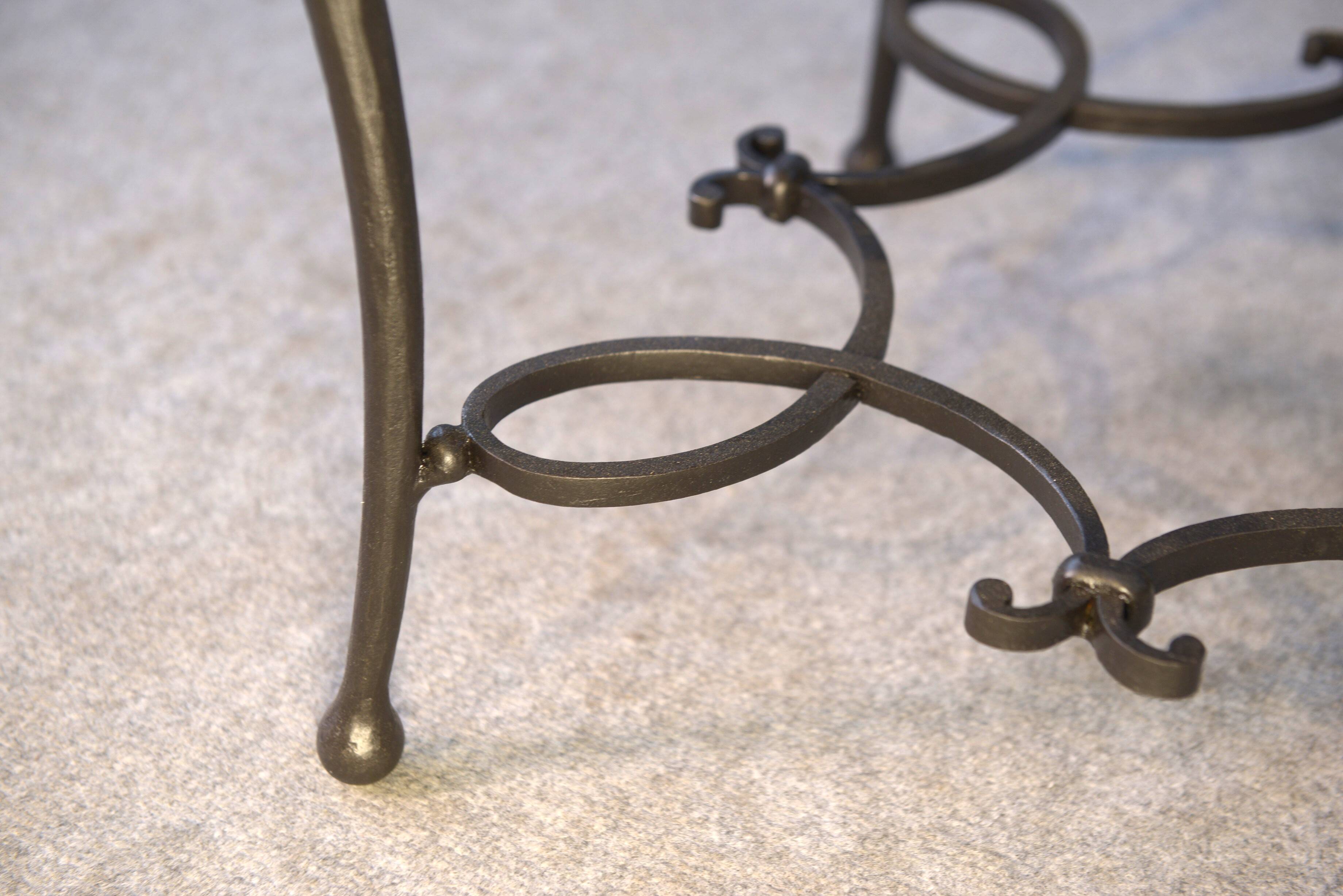 Pair of wrought iron side tables with oak tops, French work