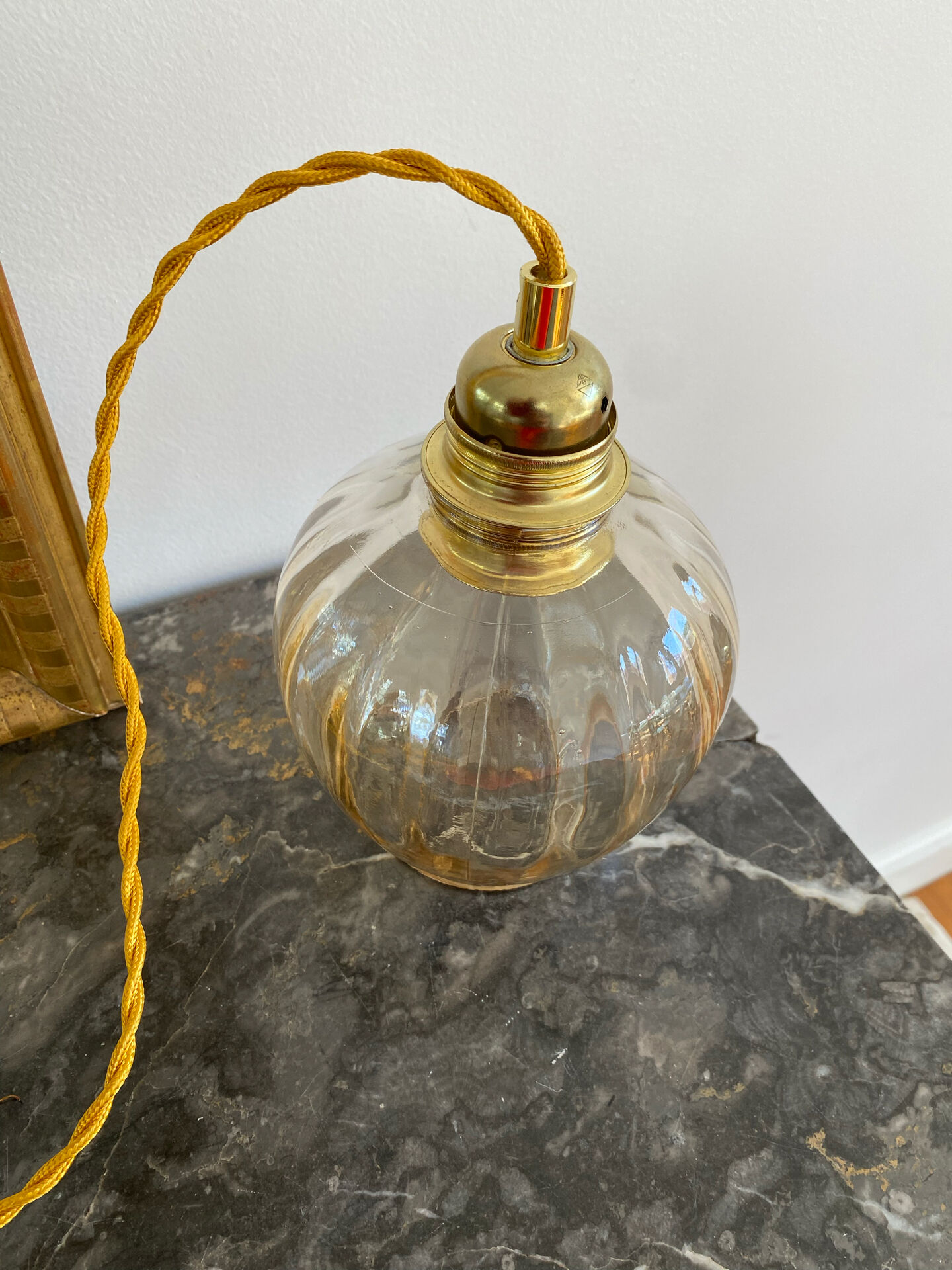 Vintage amber glass suspension globe