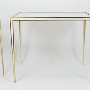 A pair of brass and white mirror tables from Vereinigte Werkstätten, Germany, 1970s.