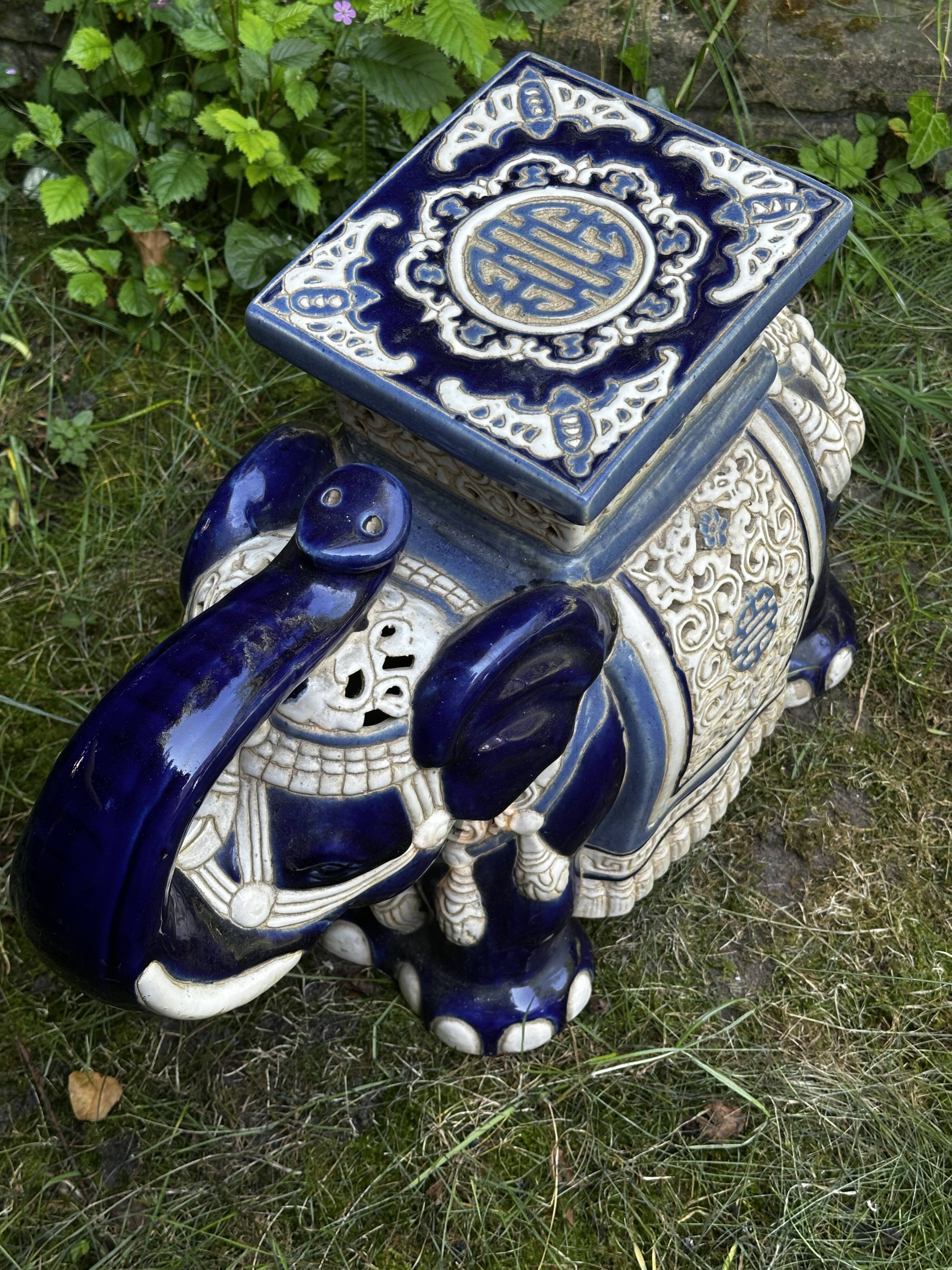 Elephant stool in glazed ceramic in cobalt blue and ivory colors