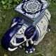 Elephant stool in glazed ceramic in cobalt blue and ivory colors