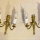 Louis XVI bronze wall sconces from the 19th century with quiver decorations.