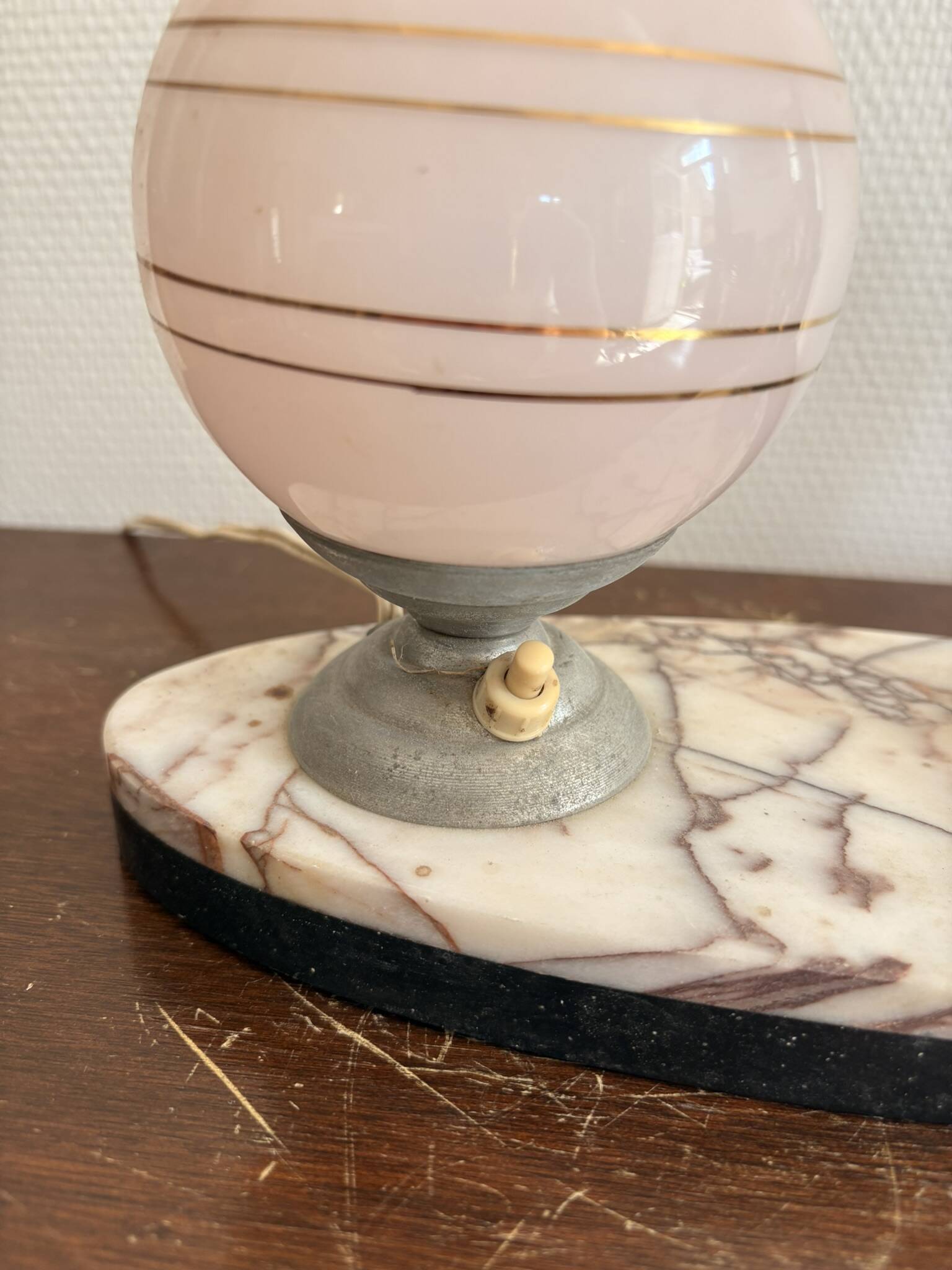 Antique Art Deco table lamp in marble and pink glass featuring a deer.