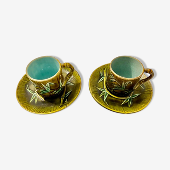 Set de deux tasses et sous tasses en barbotine "bambou" xixème siècle.