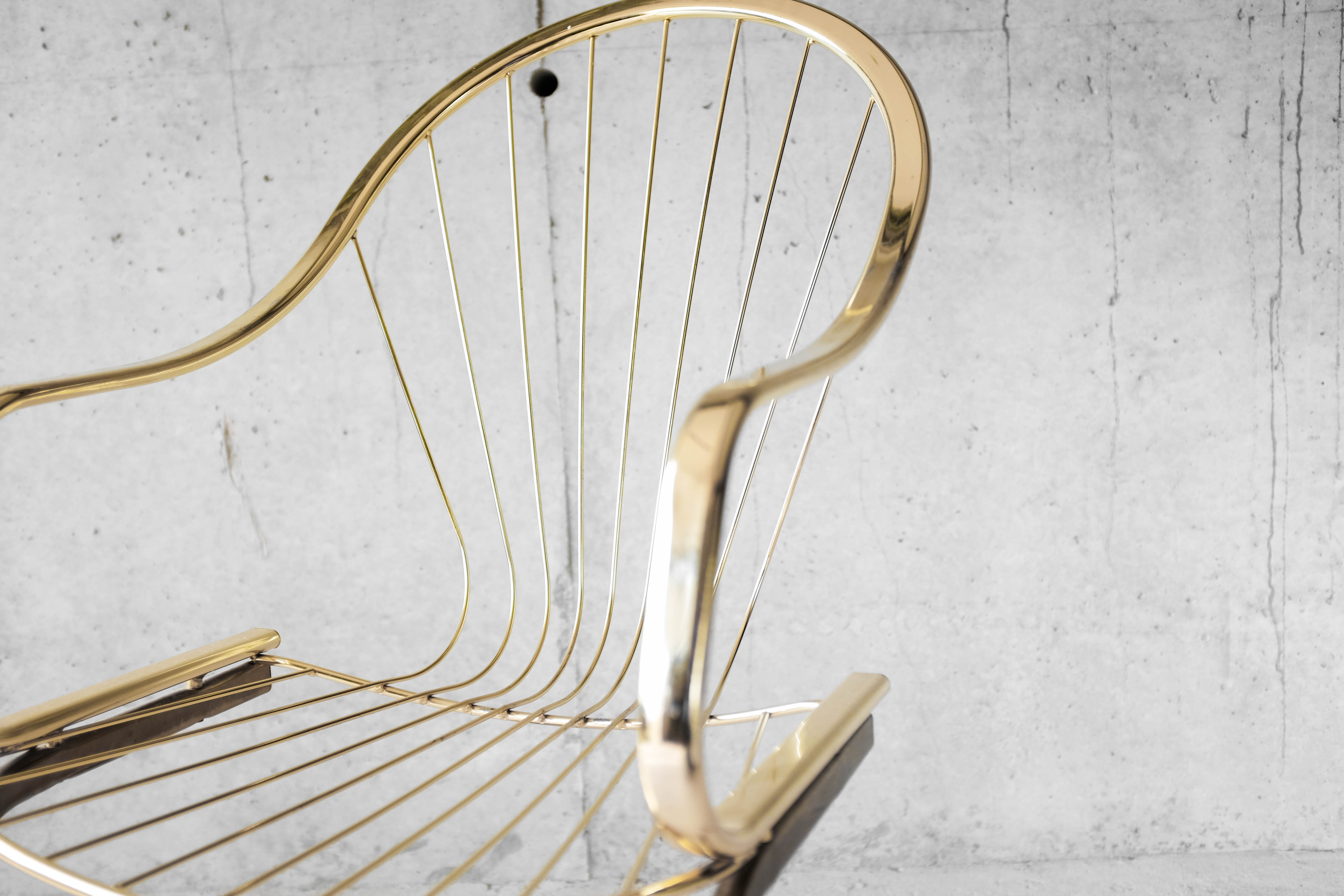 Golden metal armchair 70s