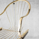 Golden metal armchair 70s