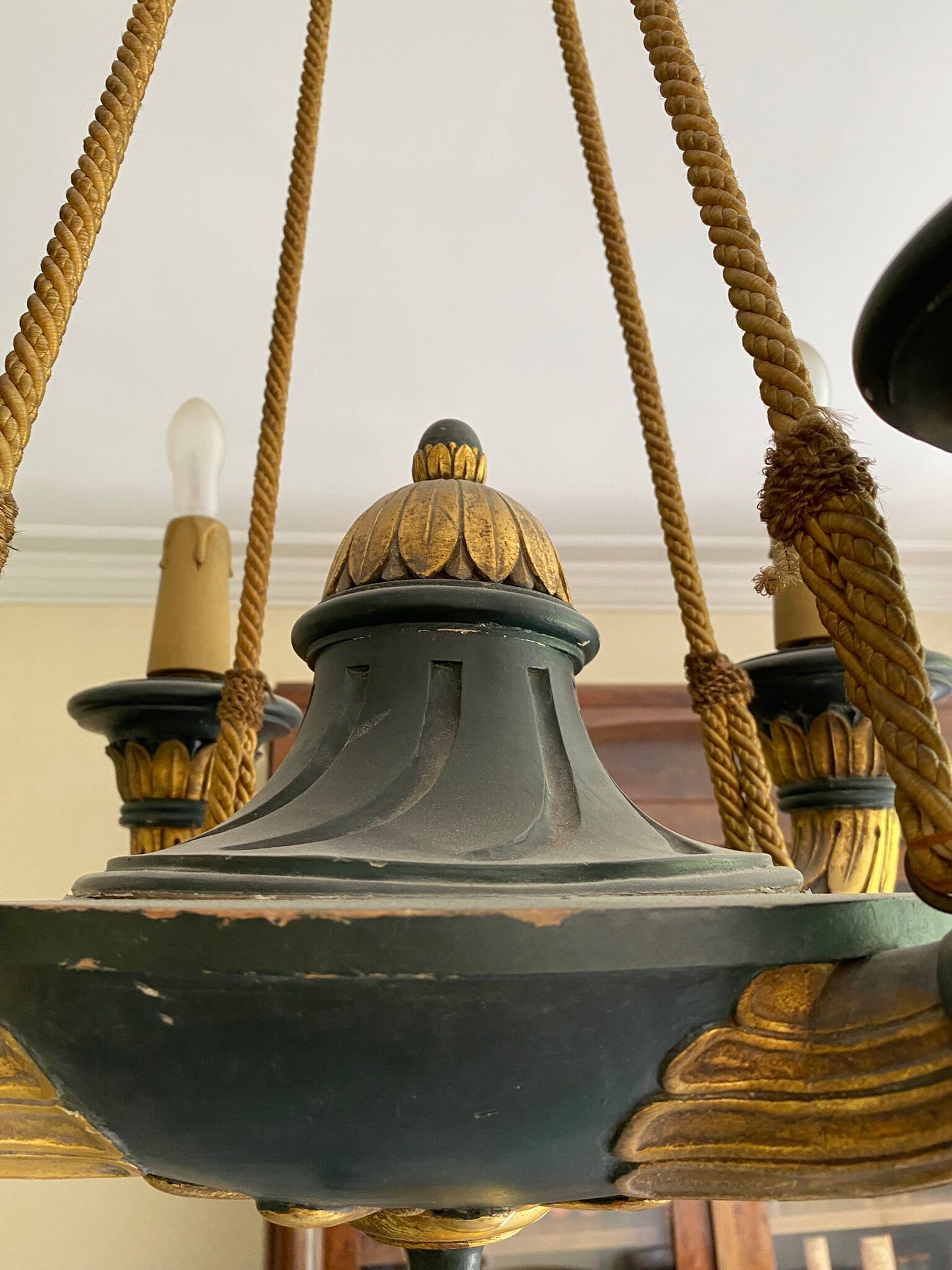 Empire style chandelier with four lights in sheet metal, bronze with patina and gilding