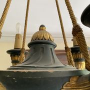 Empire style chandelier with four lights in sheet metal, bronze with patina and gilding