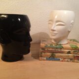 2 black and white ceramic head vases, face