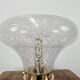 1970s table lamp in worked glass and gold metal