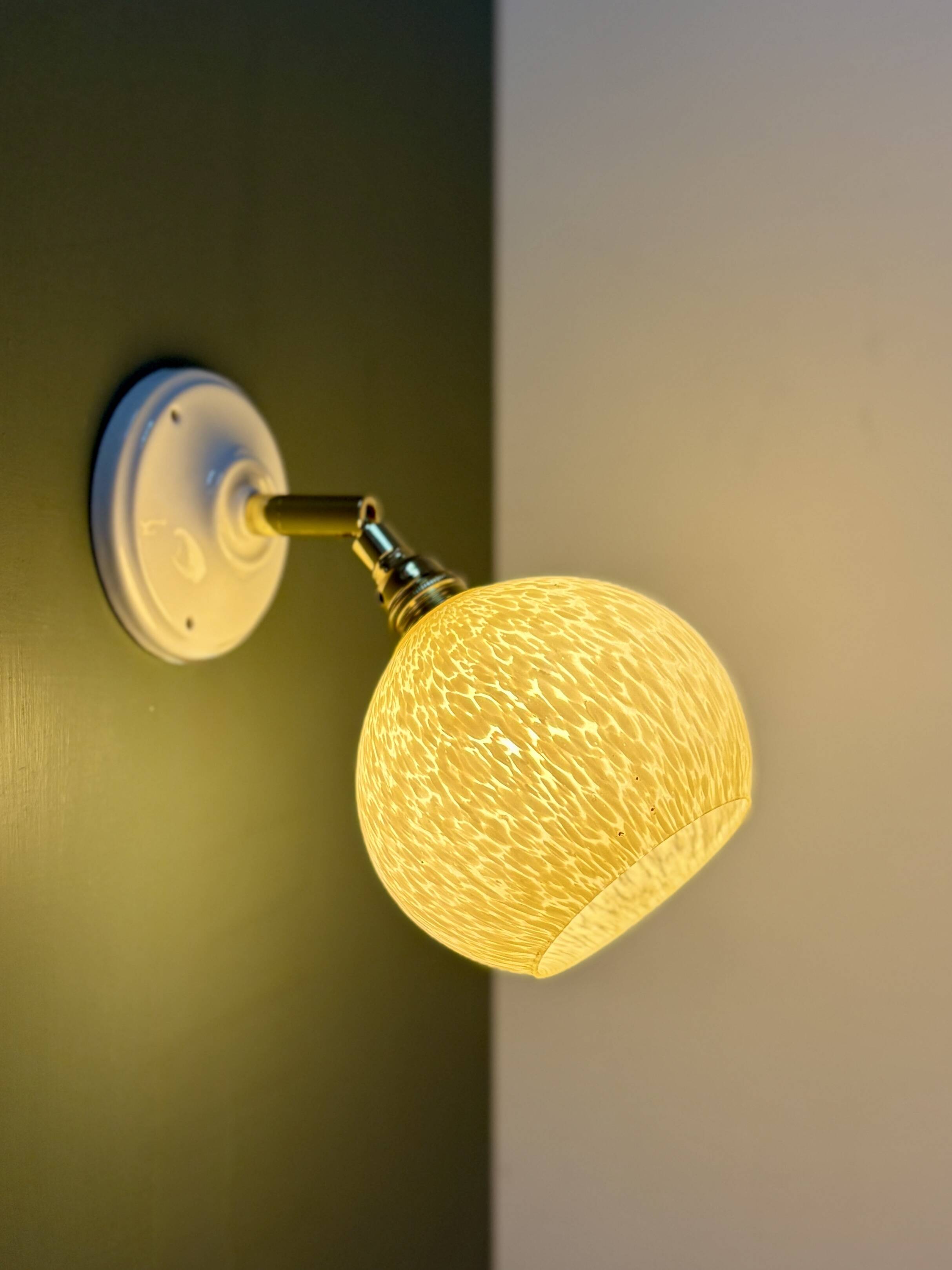 Vintage glass globe wall light in pale yellow from Clichy.