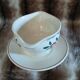 Antique sauce boat in Longchamp ironstone.
