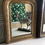 Philippe Louis mirror in gilded stucco