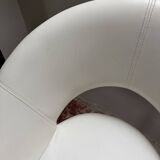 Pair of vintage white swivel armchairs in tulip style.