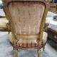 Paire de fauteuils en bois dore style Louis XVl