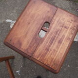 Two wooden artist stools in the early 20th century