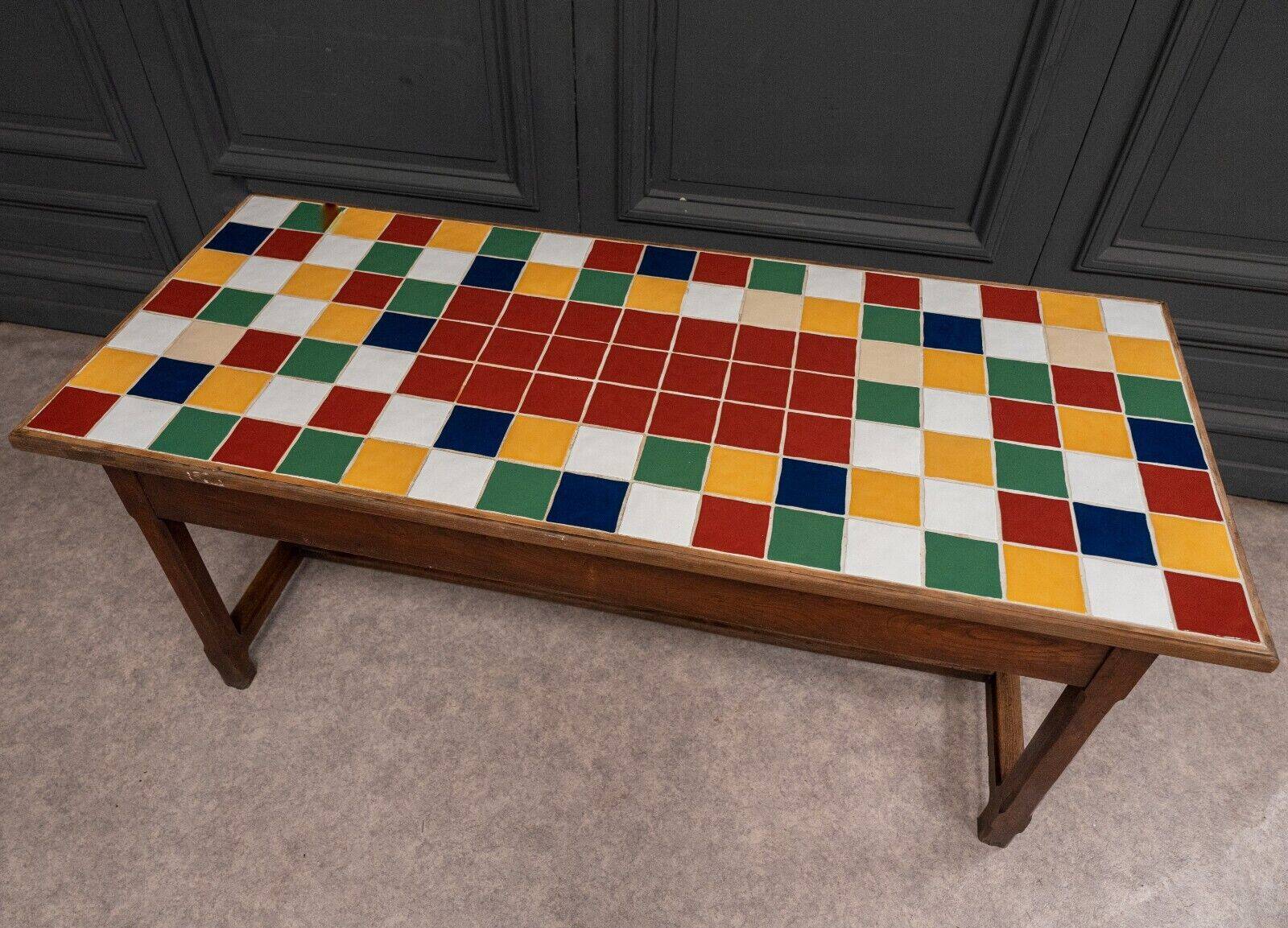 19th century oak farm table with multi-colored ceramic tiles