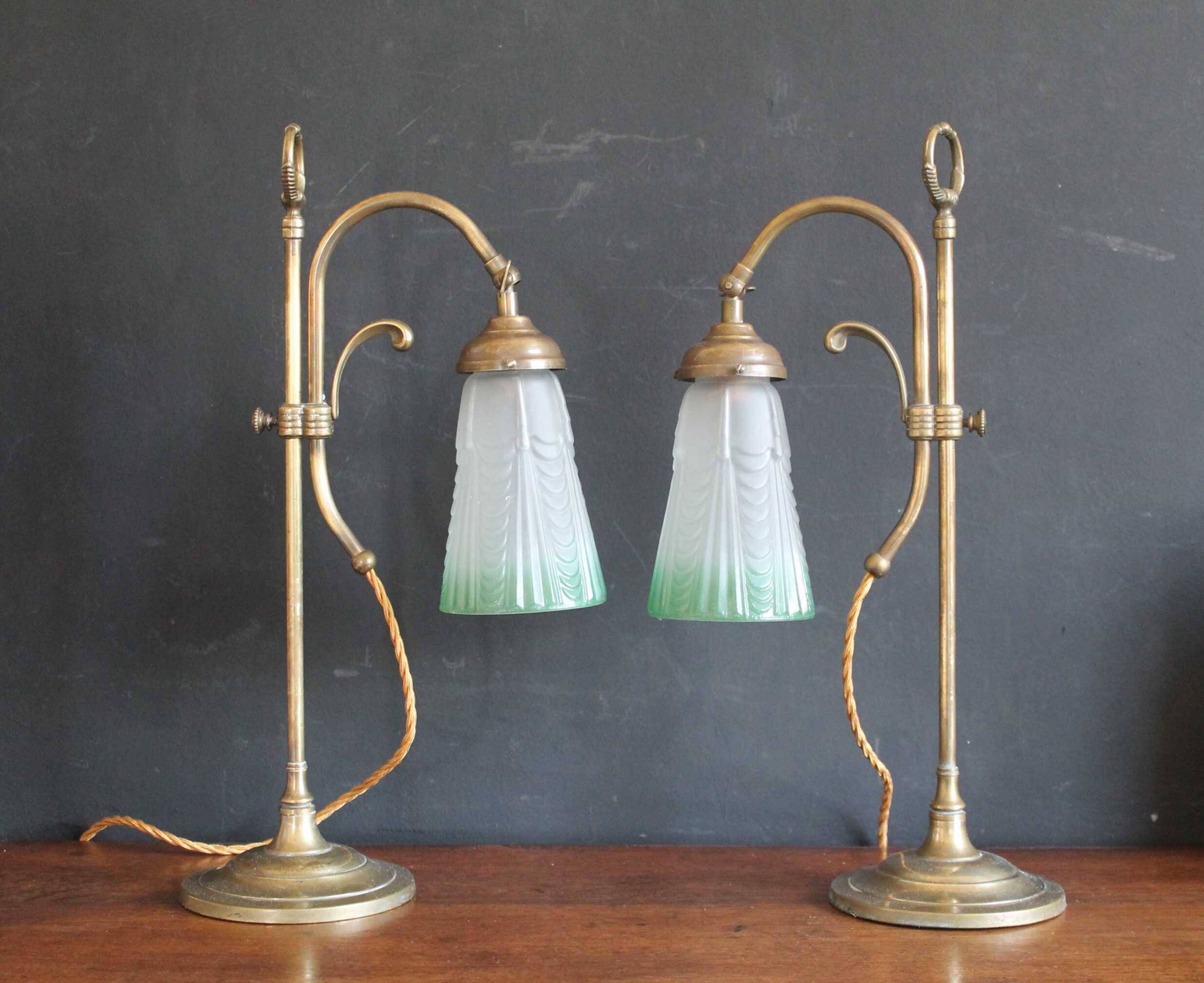 Art Nouveau style brass "rise and fall" table lamps after WAS Benson