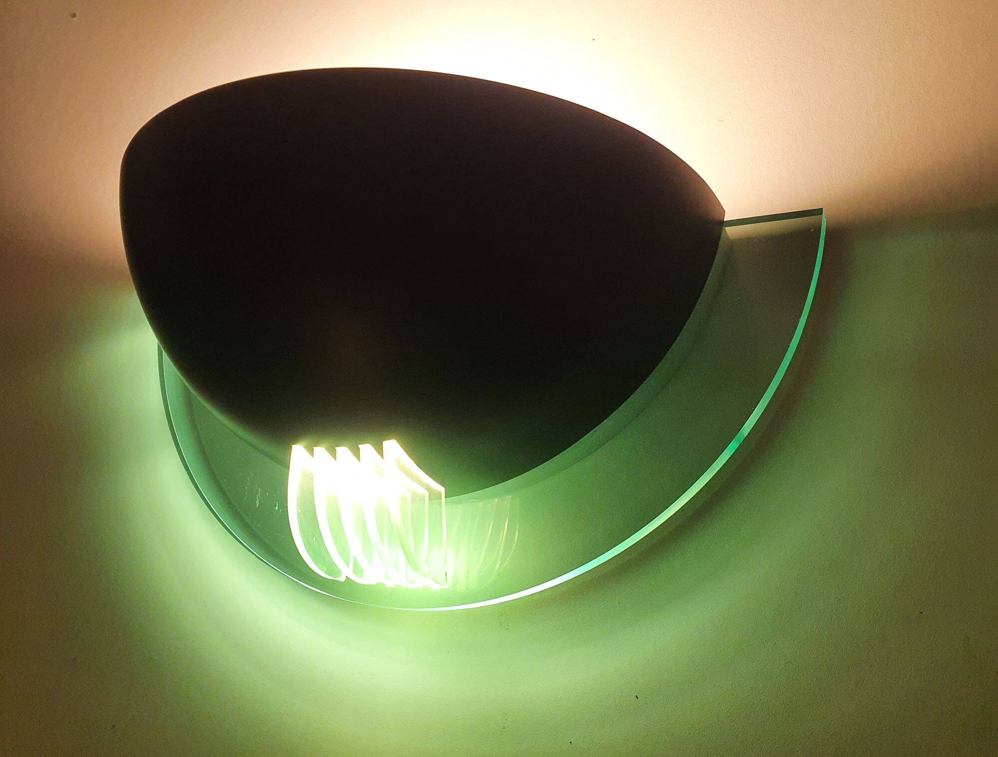 Pair of vintage black metal and plexiglass half-moon wall lights