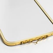 Large heavy long Mid Century brass wall mirror by Münchner Zierspiegel