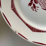 Mismatched plates in old earthenware