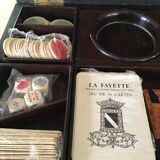 Complete mahogany wood game set with pawns, cards, and score pieces