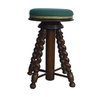 Antique piano stool with adjustable screws and turned wooden legs