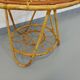 Round coffee table with 60's vintage rattan magazine tray
