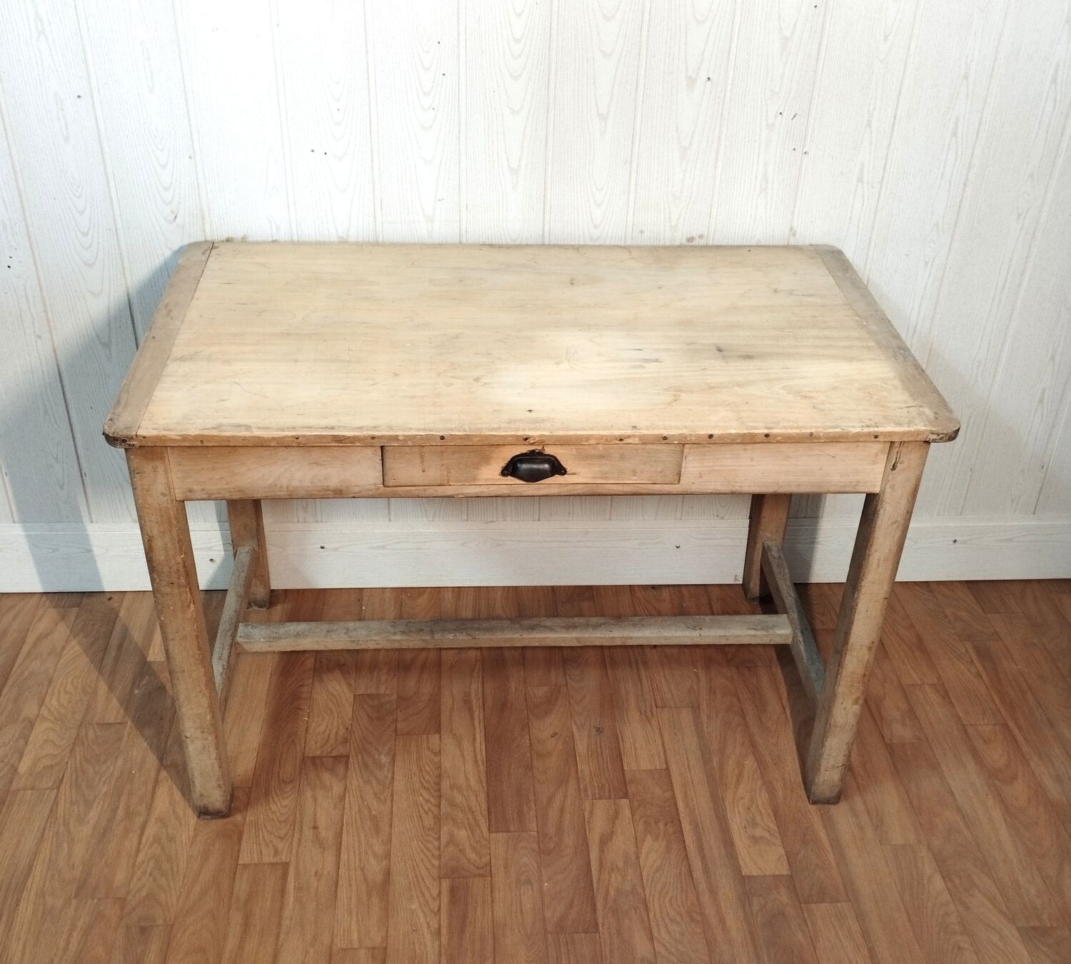 Antique farmhouse table in raw wood