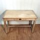 Antique farmhouse table in raw wood