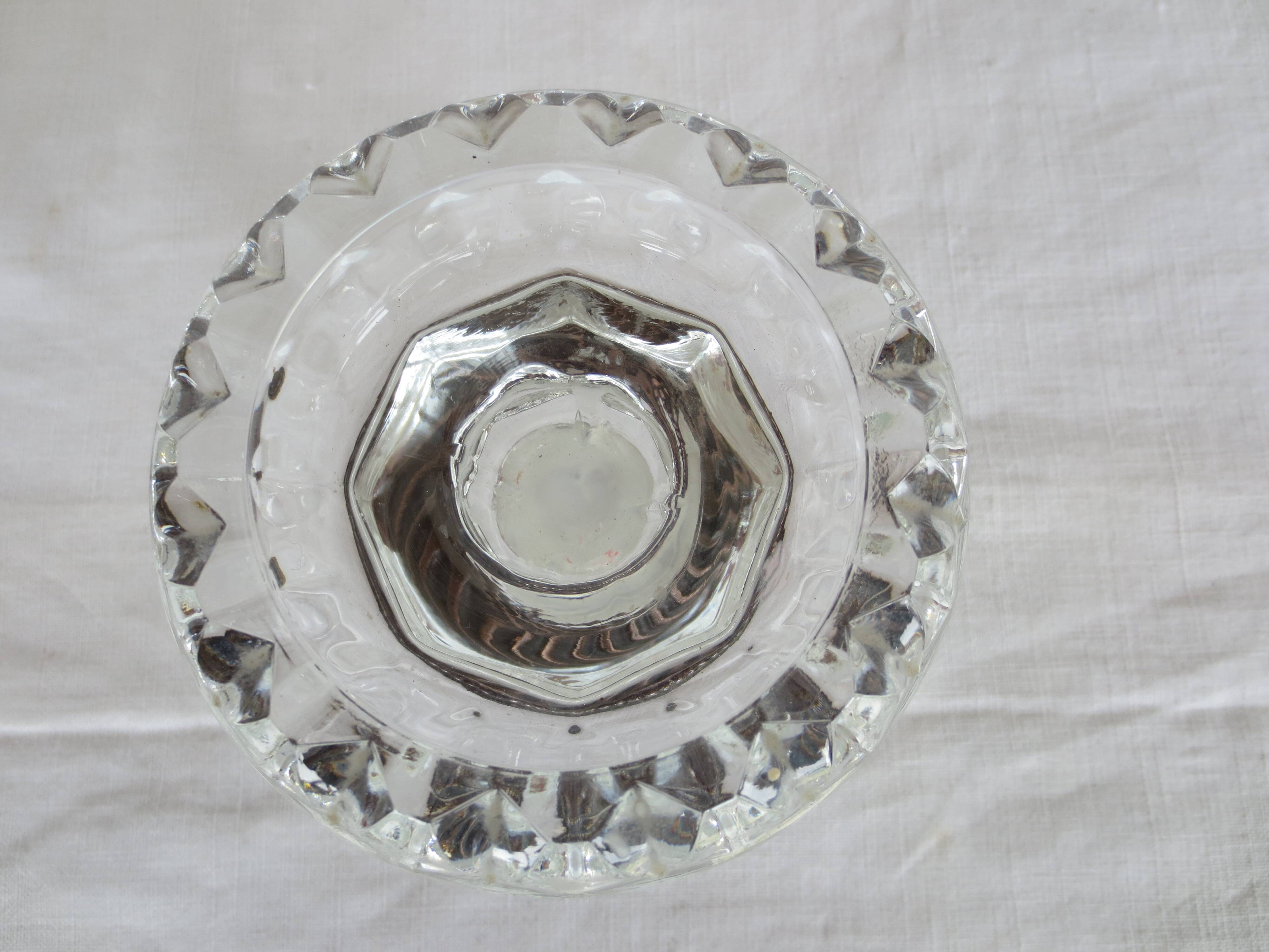 Two candle holders in bronze and crystal