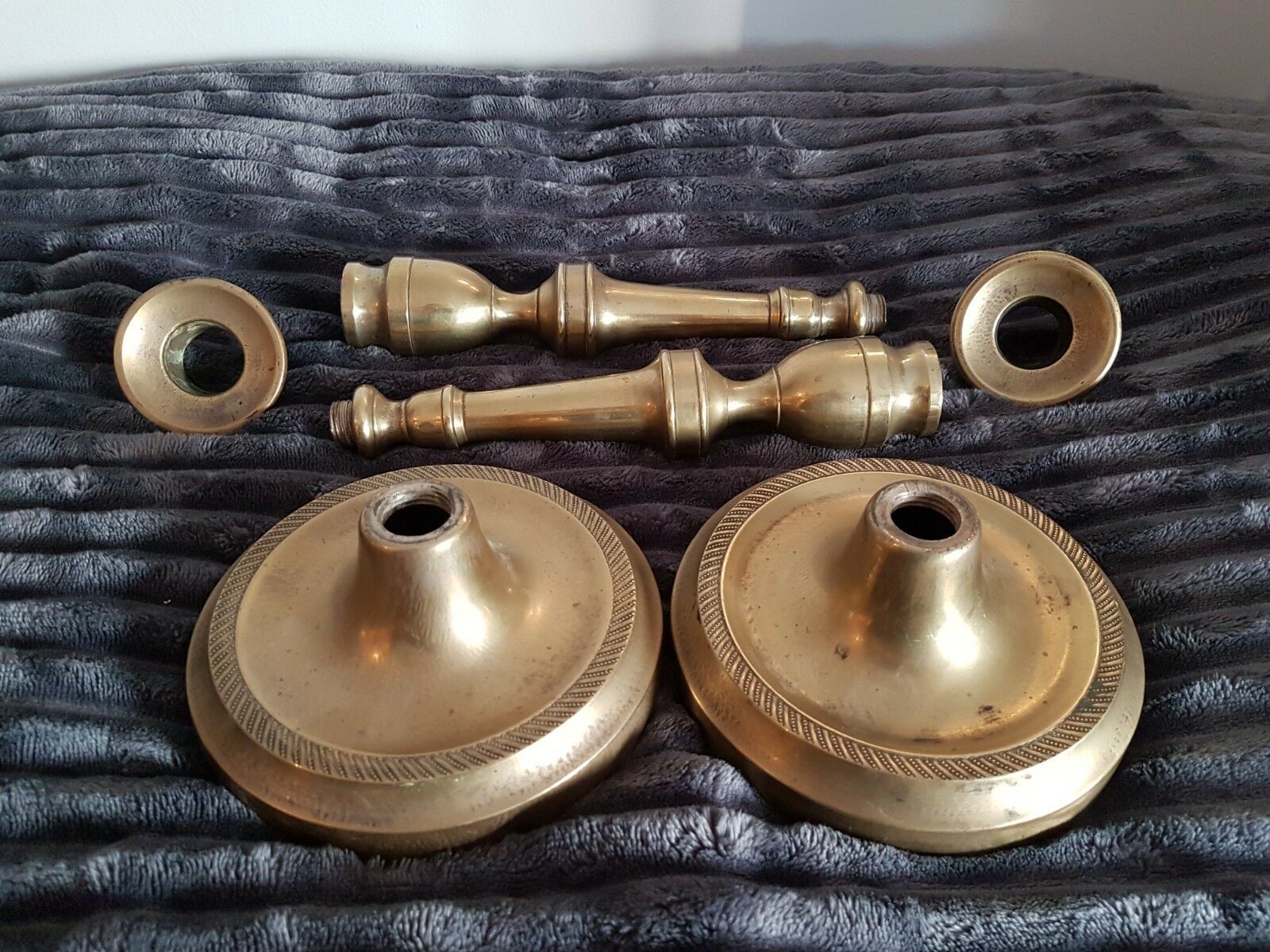 Pair of bronze church candlesticks