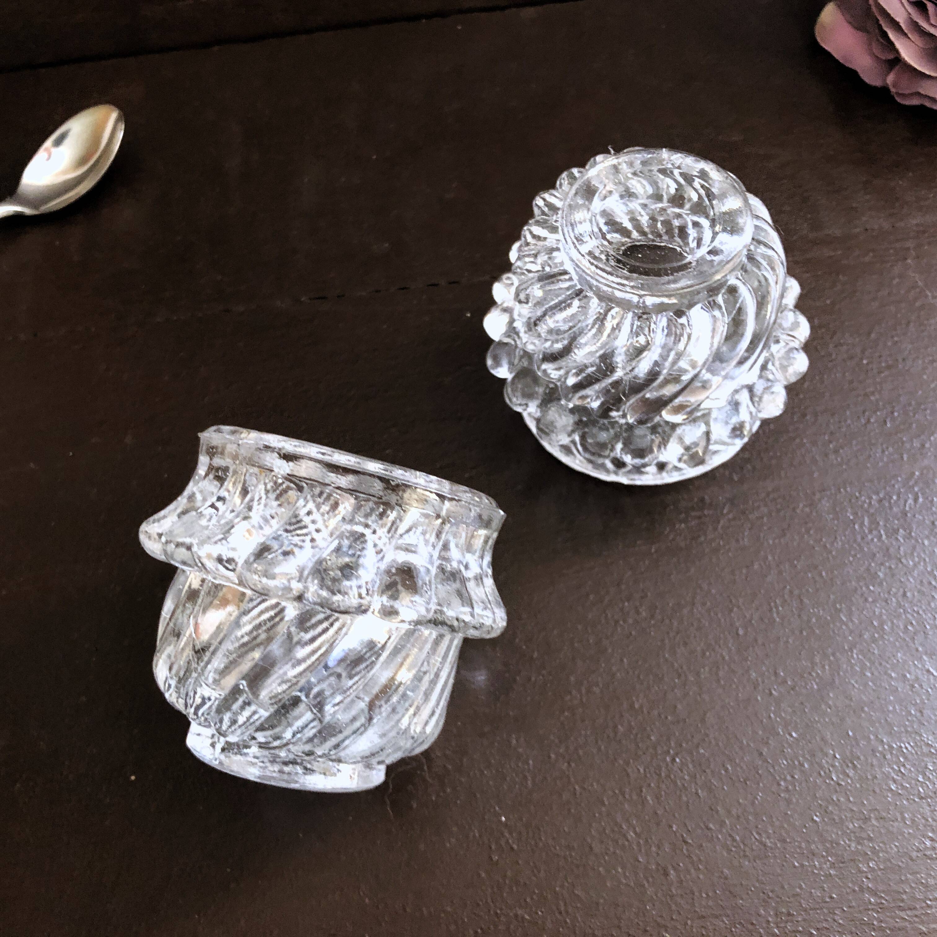 Glass salt and pepper shaker set with vintage serving spoon