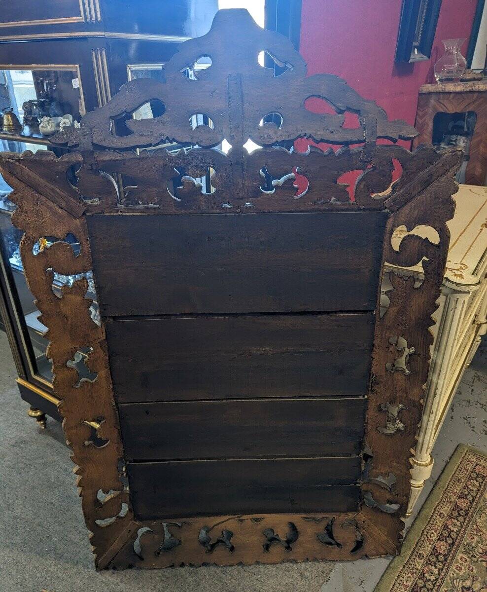 Large Italian mirror in carved and gilded wood