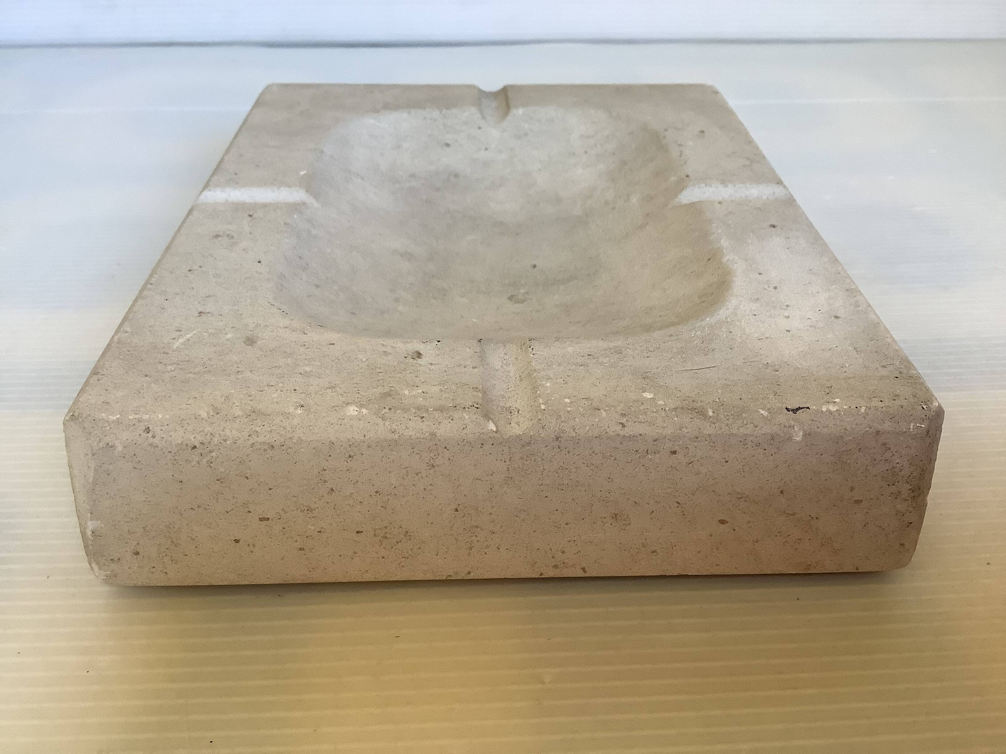 Stone ashtray pocket emptier